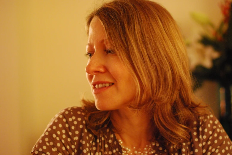 a close up of a woman with blonde hair