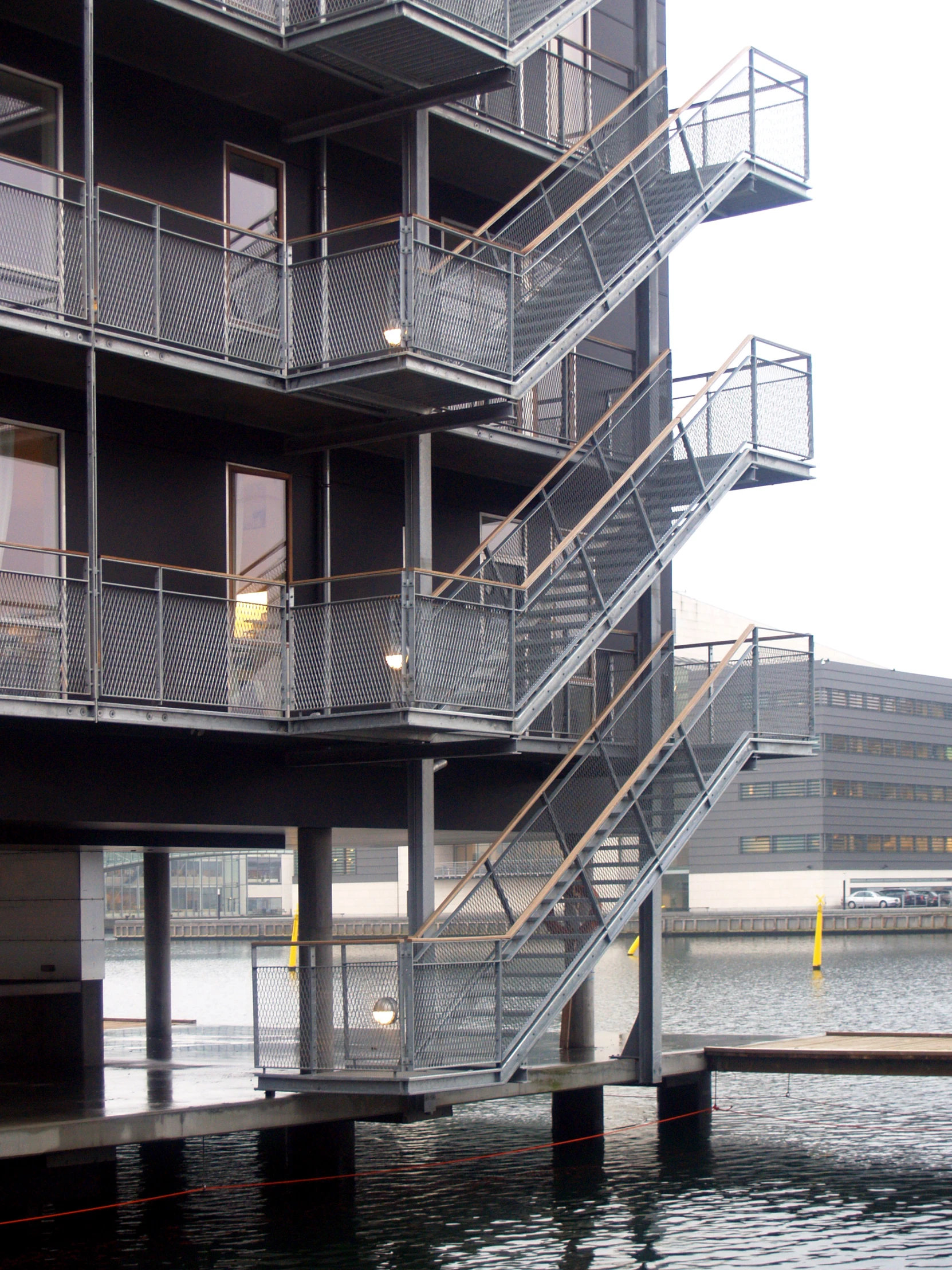 an old building with a lot of balconies next to it