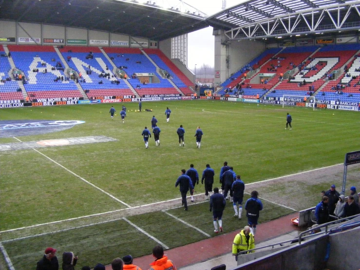 a soccer game being played in a stadium