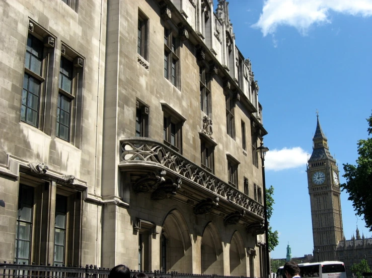 an old stone building and clock tower