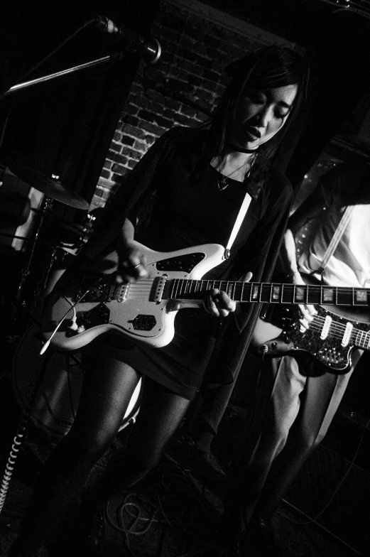 black and white pograph of a band playing music