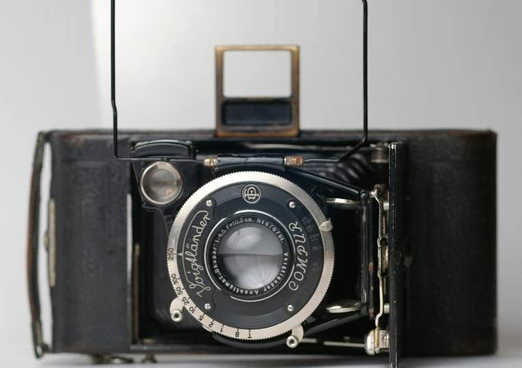 an old, black camera that is showing the shutter track