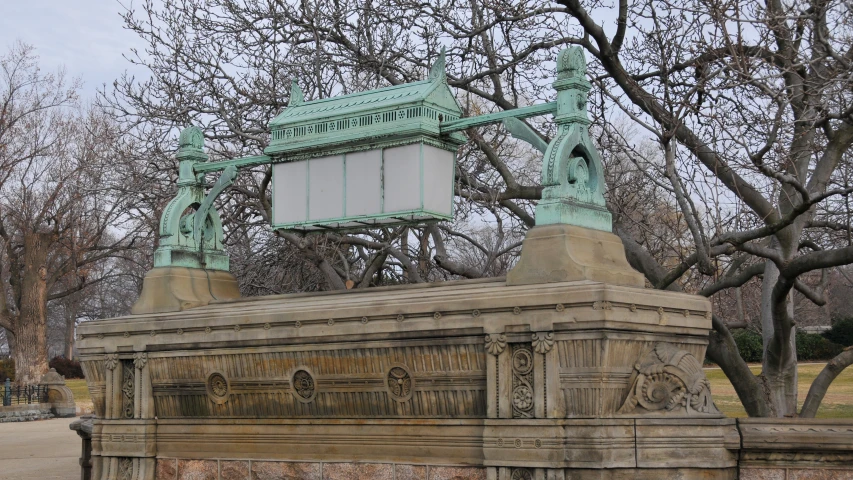 a monument with a clock on top of it