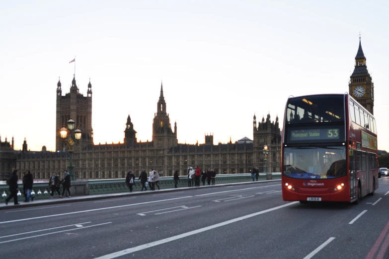 a bus is driving on a highway with other traffic