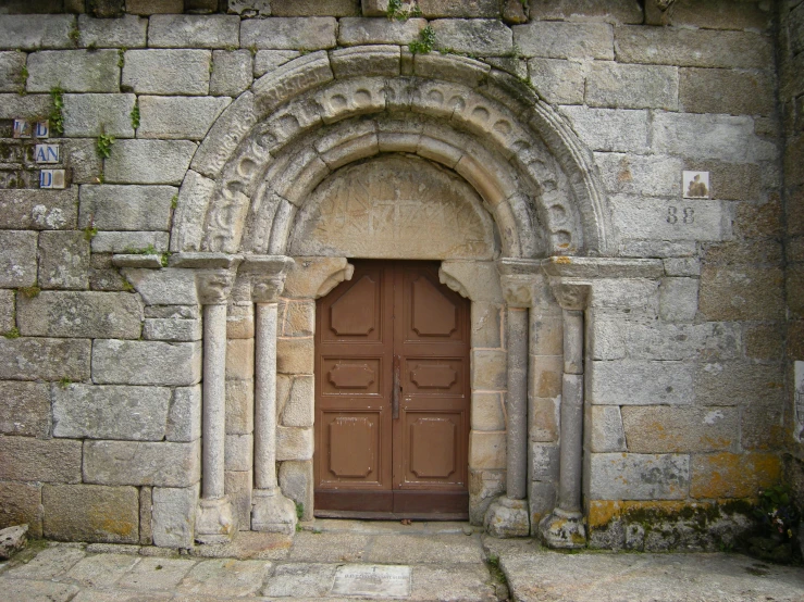 a door is open on a stone building
