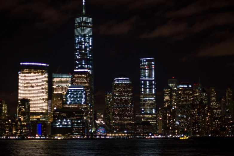 a large city is lit up at night