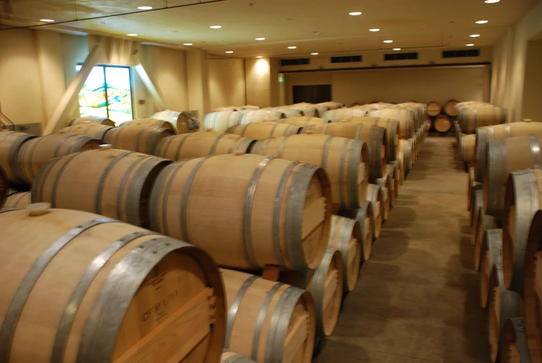 the large room is full of barrels that are waiting to be filled