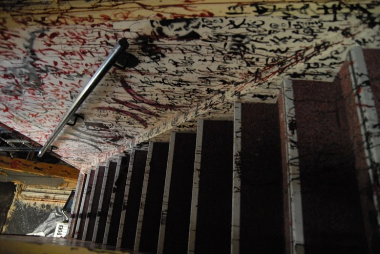 graffiti on the walls and stairways painted black