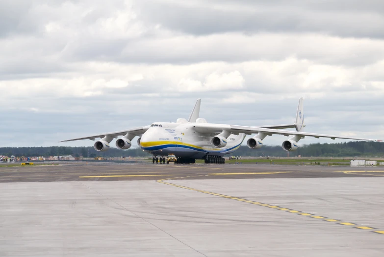 a huge commercial airliner is sitting on the tarmac