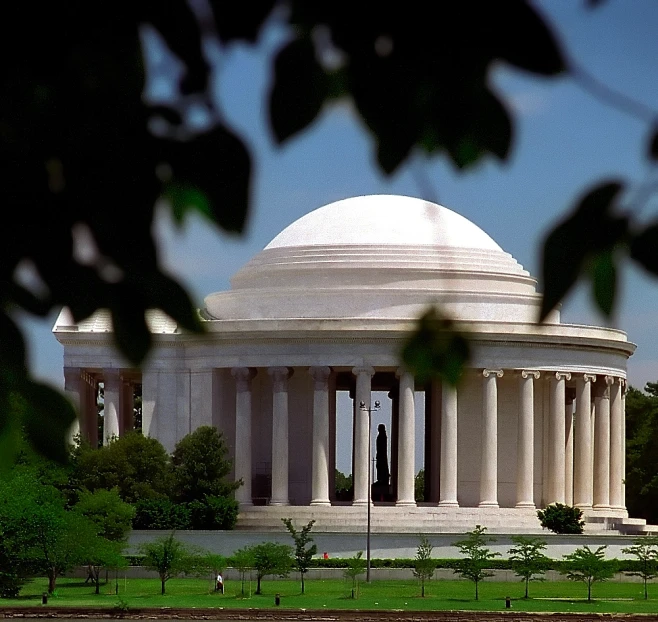 view of a white monument, with trees around it