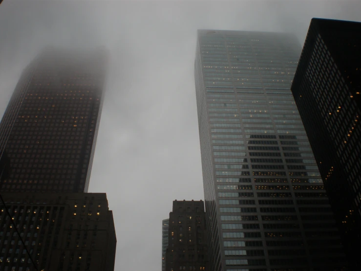 the view of a very tall building with lots of lights