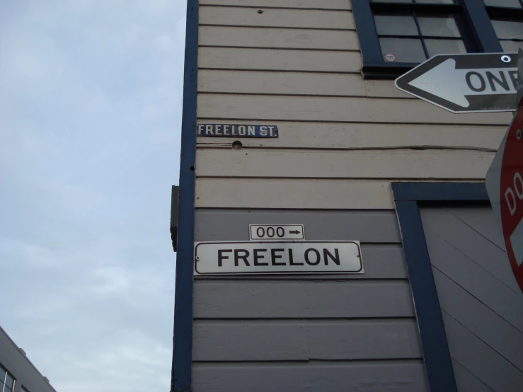 street signs in front of a building in the usa