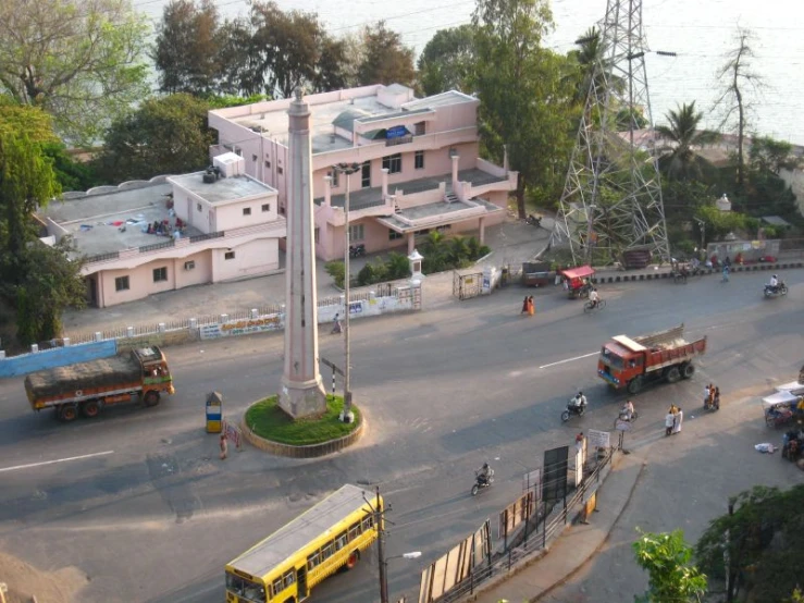 the clock tower stands tall over a city street