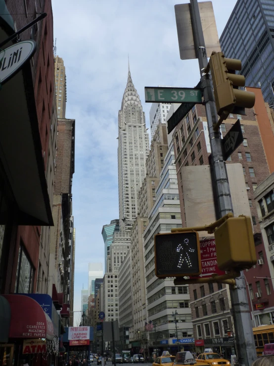 a busy city street with tall buildings