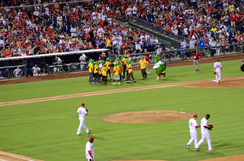 a baseball game in progress with a few players on the field