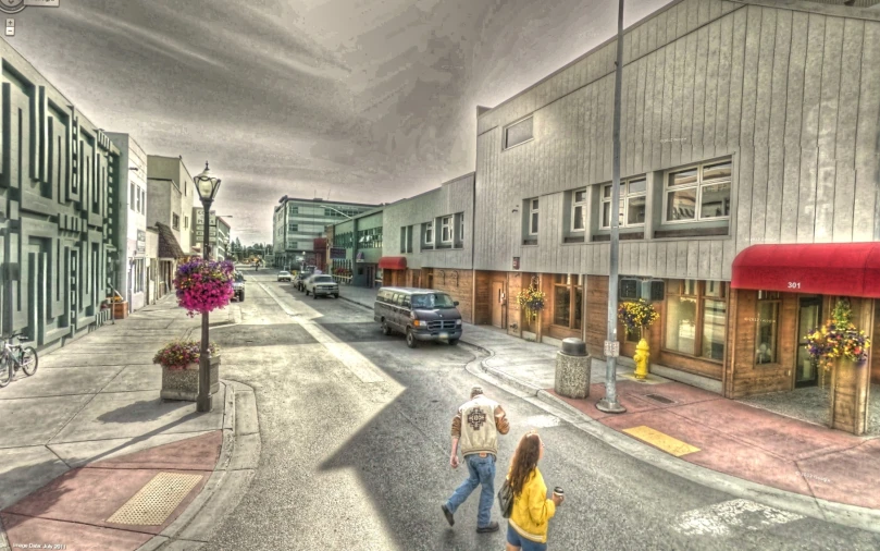 two people walking down the street on a rainy day