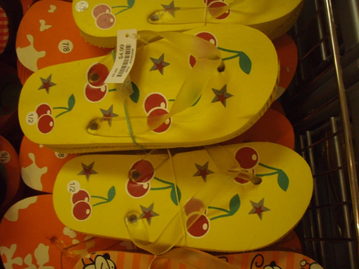 pairs of shoes sitting on display in a shoe store