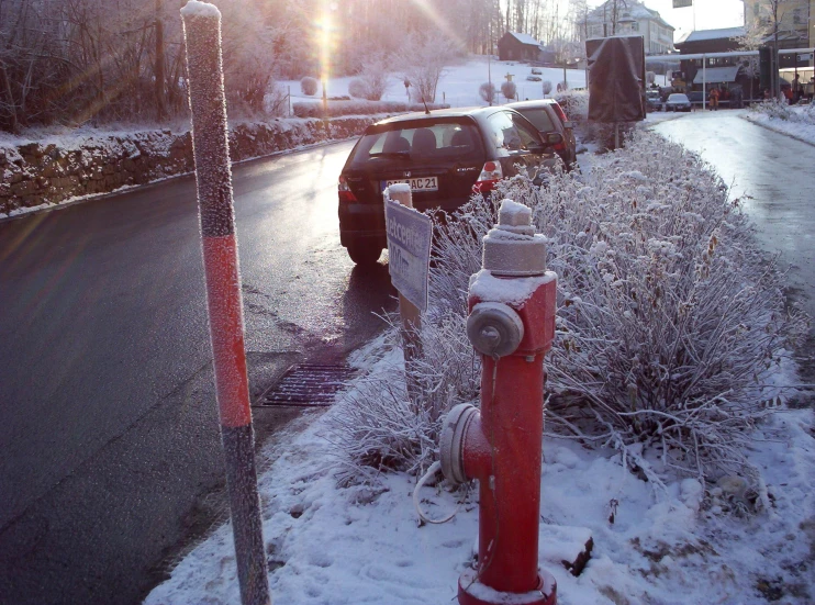 a fire hydrant that is covered in snow