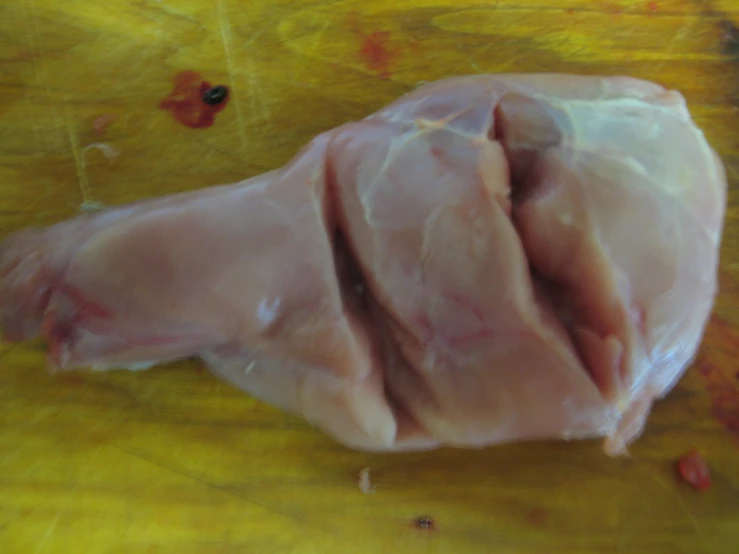 raw chicken on wooden table ready for 
