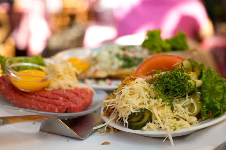 a close up of plates of food on a table