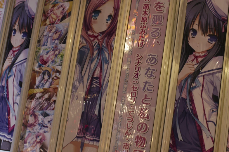 four framed anime artwork with various girls