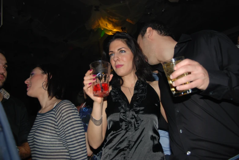 a group of people enjoying different wines with glasses