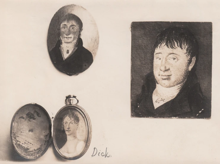 an antique po of two people with one face in the mirror and a locke with an unknown figure