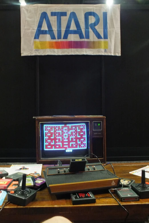 a video game set up on a table with an atlas sign