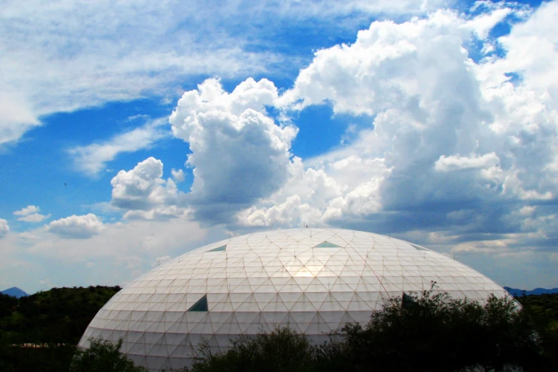 a huge dome under some cloudy blue skies