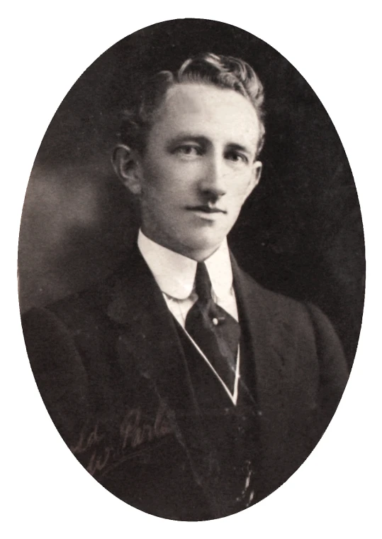 a portrait picture of a young man wearing a suit and tie