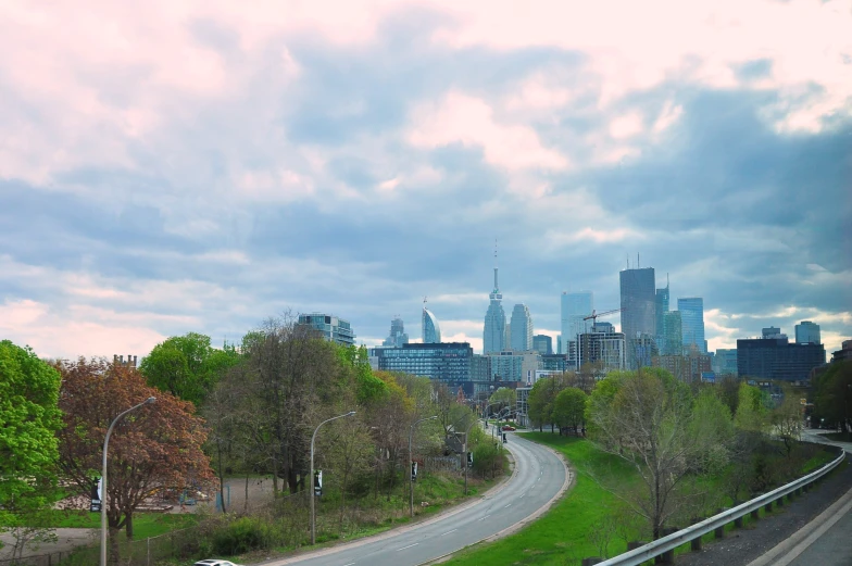 a long stretch of road through the middle of a city