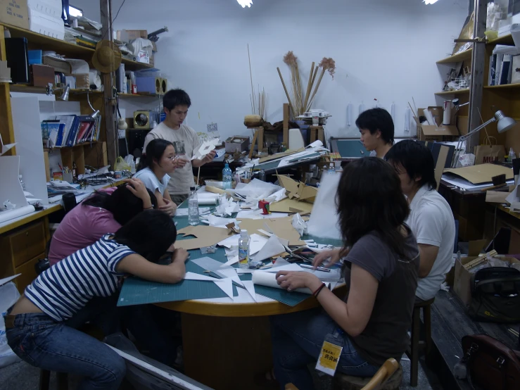 a group of people at a table together