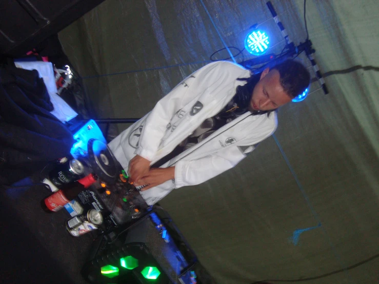 a dj at a festival on his turntable