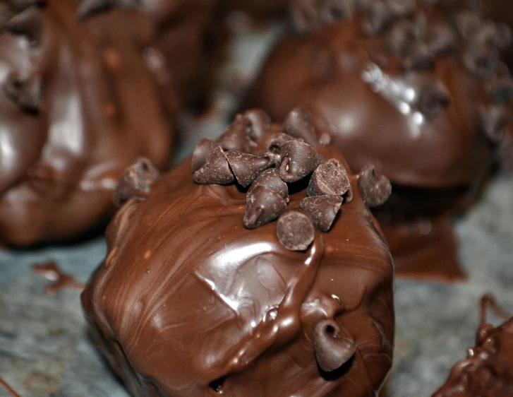 chocolate covered cookies with nuter toppings displayed