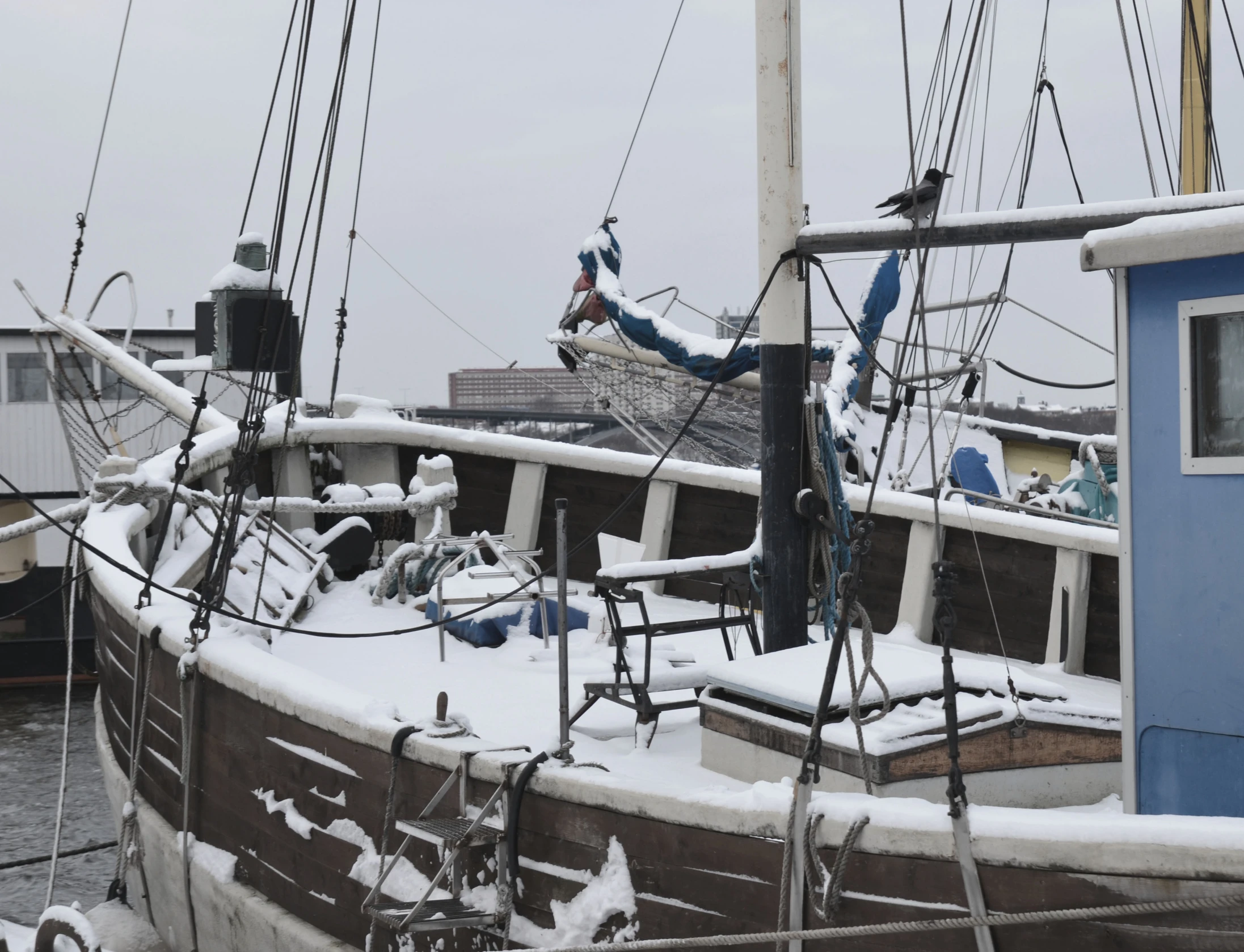 a large boat that has some snow on it