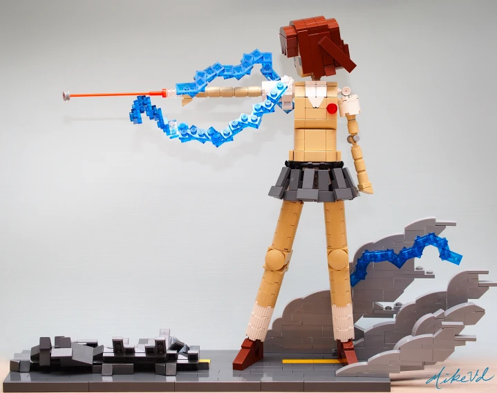 this is a lego figurine of a woman holding a wand