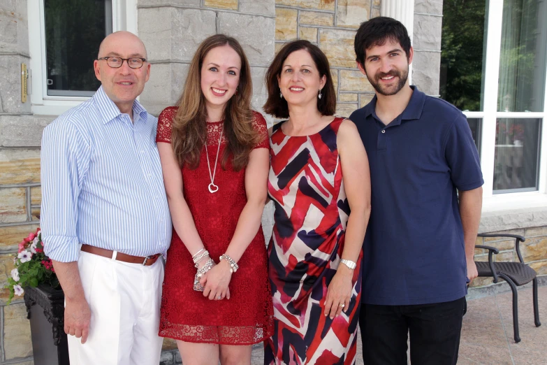 there are three people that are standing together