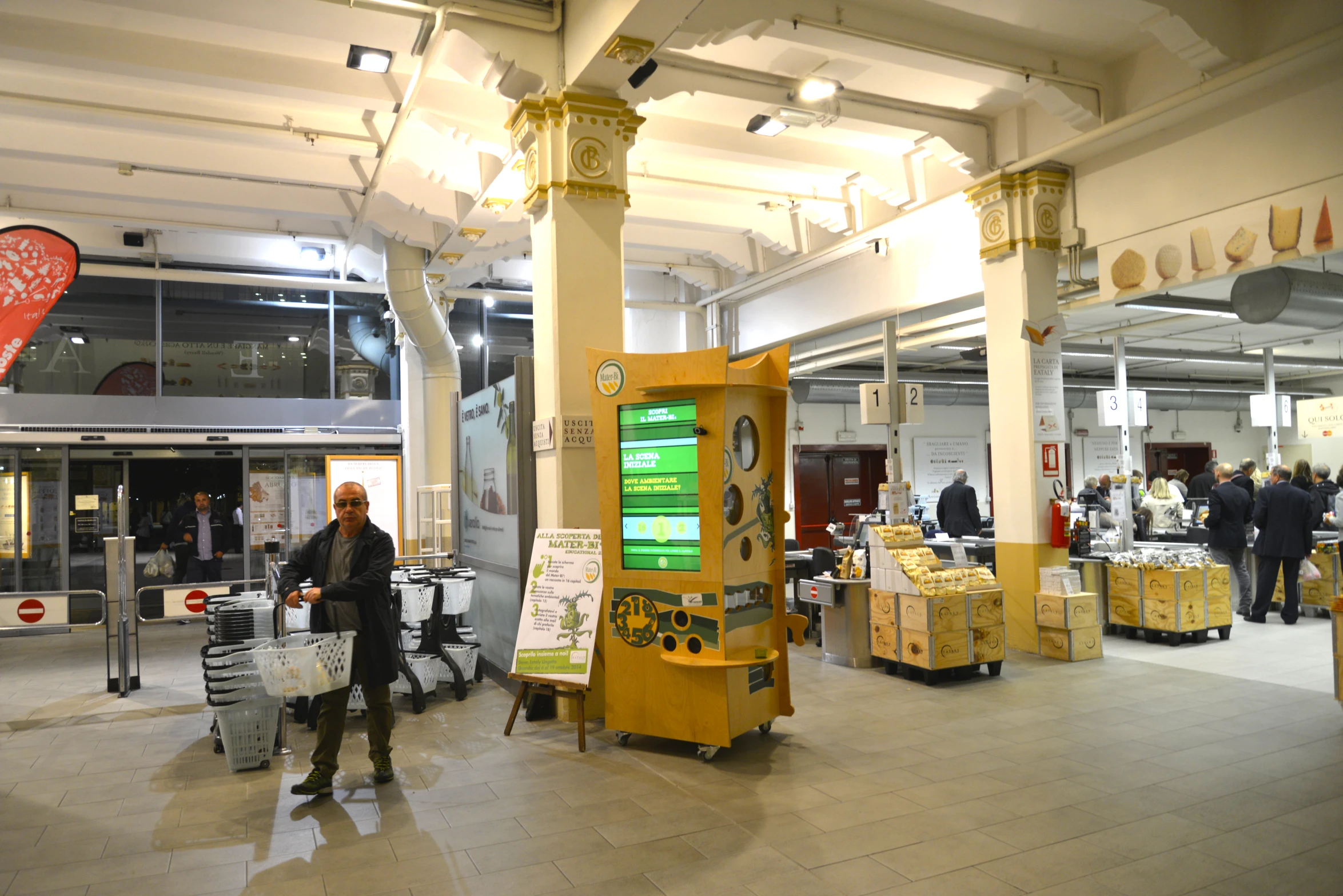 an exhibit stand displays various items in a building