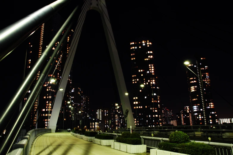 the city skyline is lit up at night