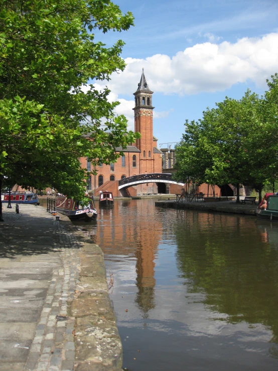 there is a clock tower on the side of a building