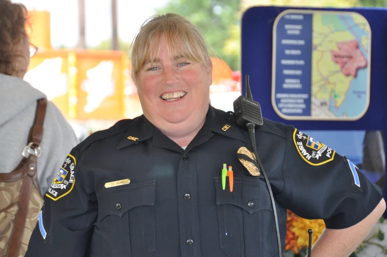 an image of a female police officer smiling