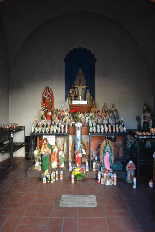 an altar with many religious items in it