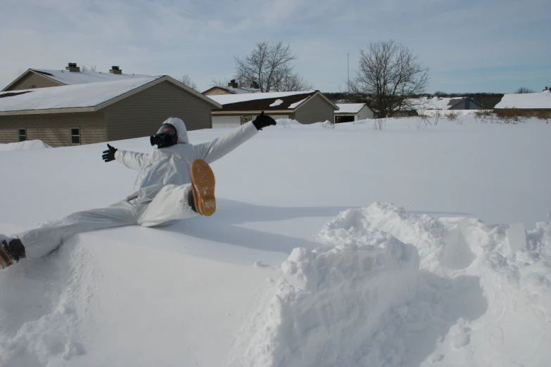 a man with a snow board in the snow