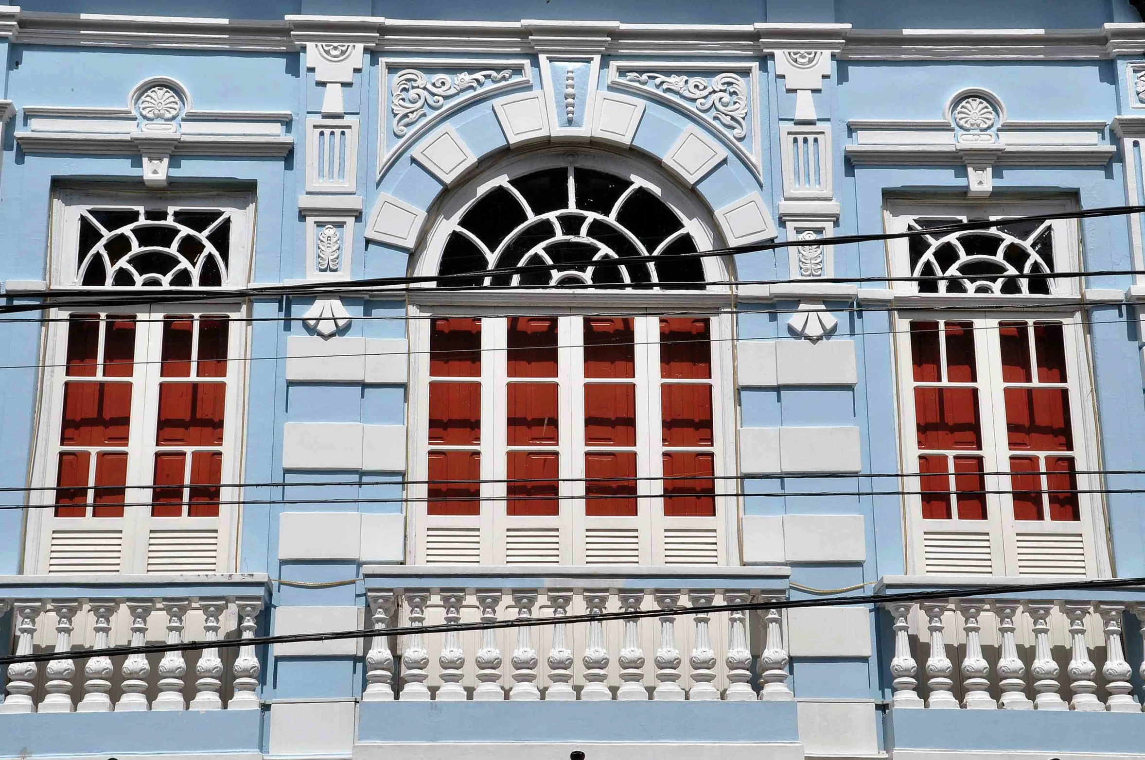 several windows and balconies are visible from an old building