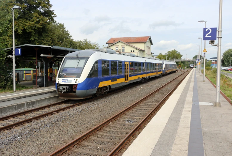 a train pulling into a station with no passengers