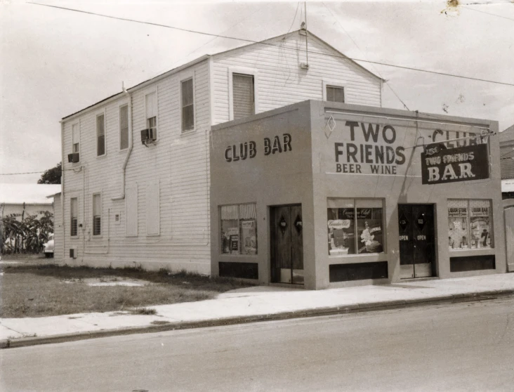 an old image of two friends liquor company