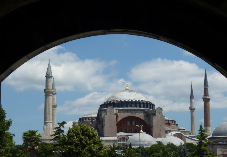 the view out a window to a mosque