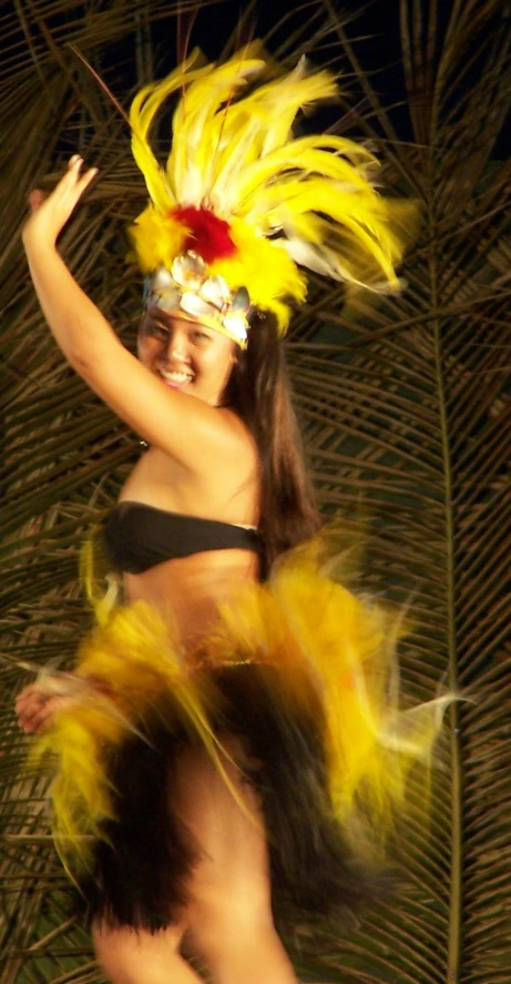 a  dancing in costume on the beach