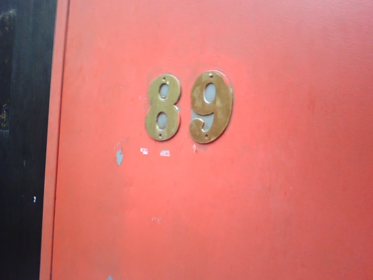 the door number 99 is gold and says 80