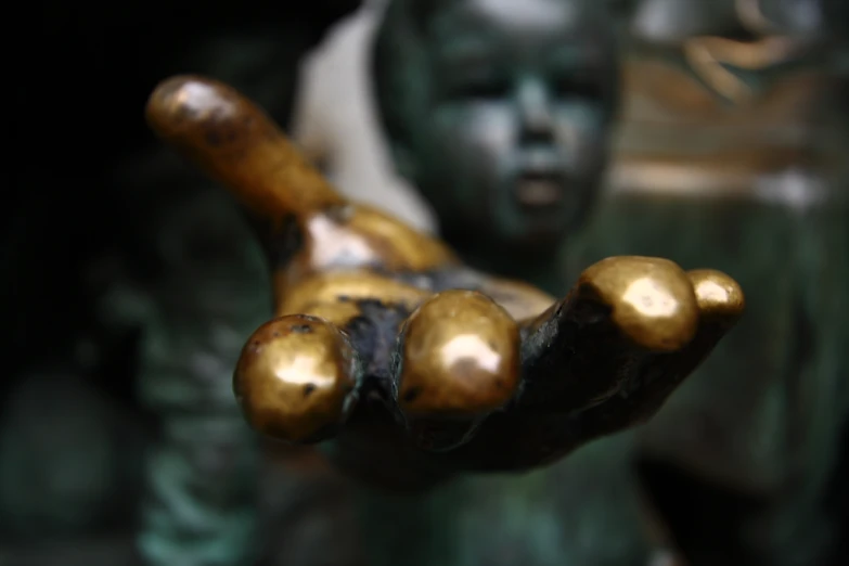 gold ornaments on a statue of two bears